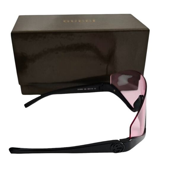Gucci GG1650S 002 shield mask sunglass with a shiny black frame